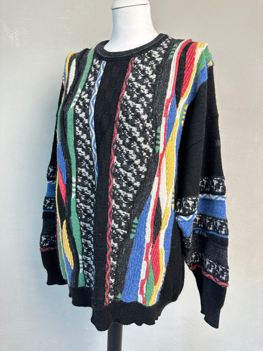 Zwarte trui met gekleurde vertikale banen