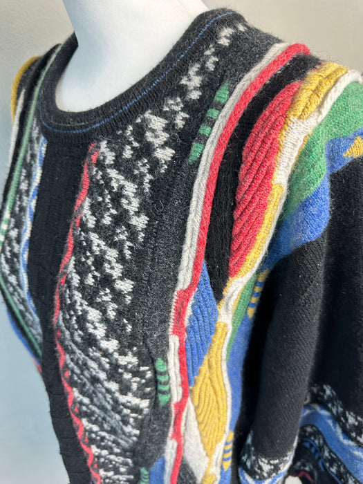 Zwarte trui met gekleurde vertikale banen