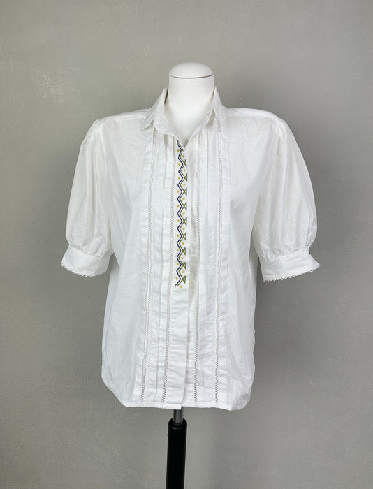 Wit bloesje met pofmouwen