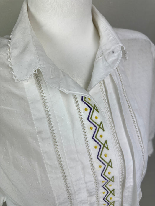 Wit bloesje met pofmouwen