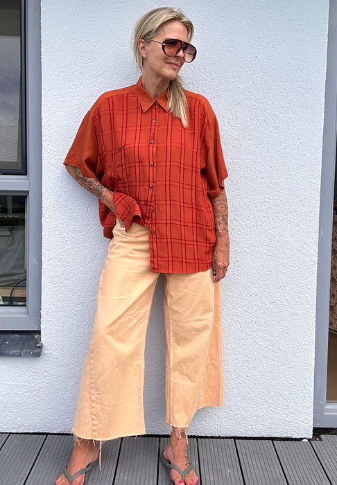 Roestkleurige blouse in soepele stof