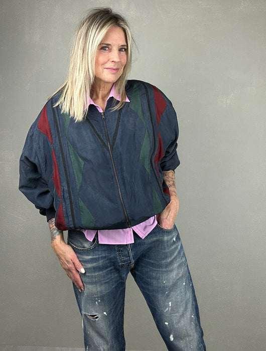 Blauw zijdeachte bomber jasje