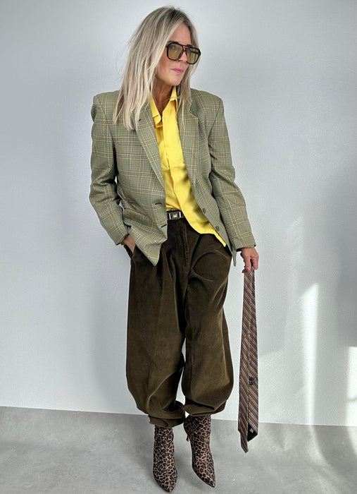 Groene ribbroek.