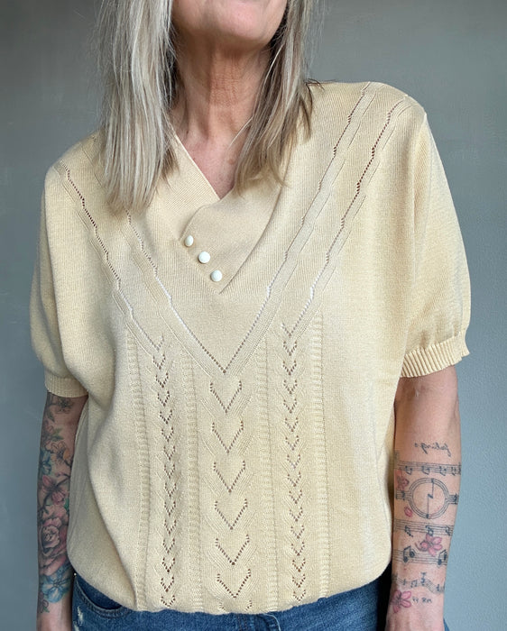 Ajour truitje in zachtgeel