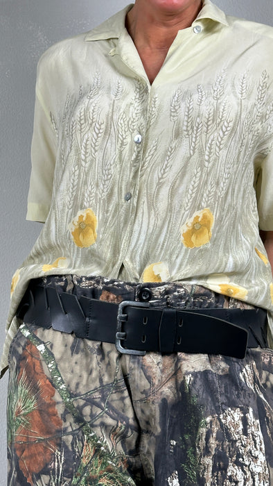 Zachtgele blouse met bloem motief