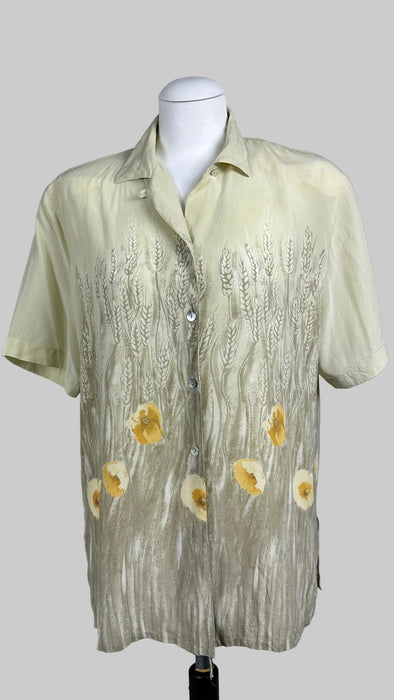 Zachtgele blouse met bloem motief