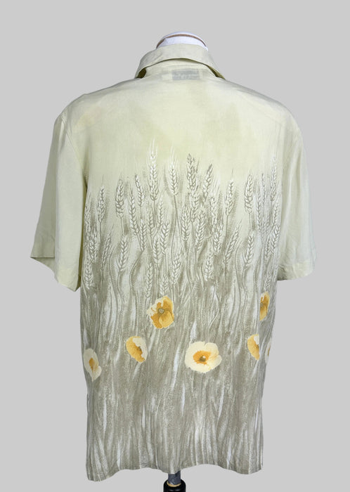 Zachtgele blouse met bloem motief
