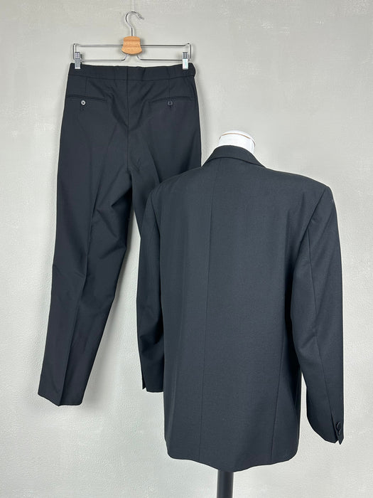 Smoking kostuum met puntige revers