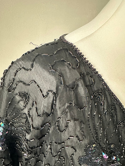 Zwarte kraaltjes top