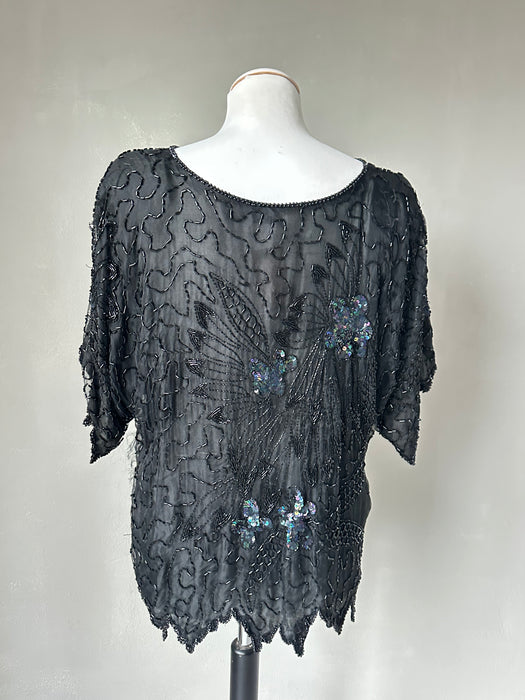 Zwarte kraaltjes top