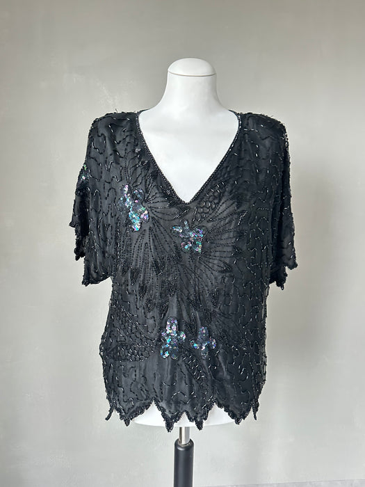 Zwarte kraaltjes top