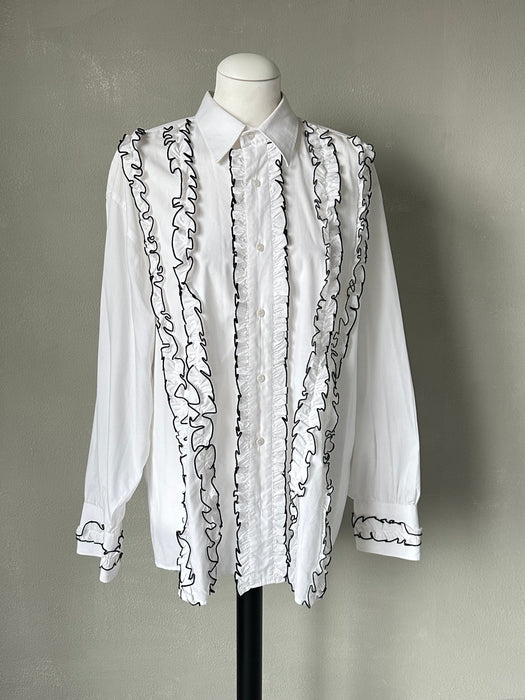 Blouse met roezels