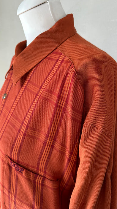 Roestkleurige blouse in soepele stof