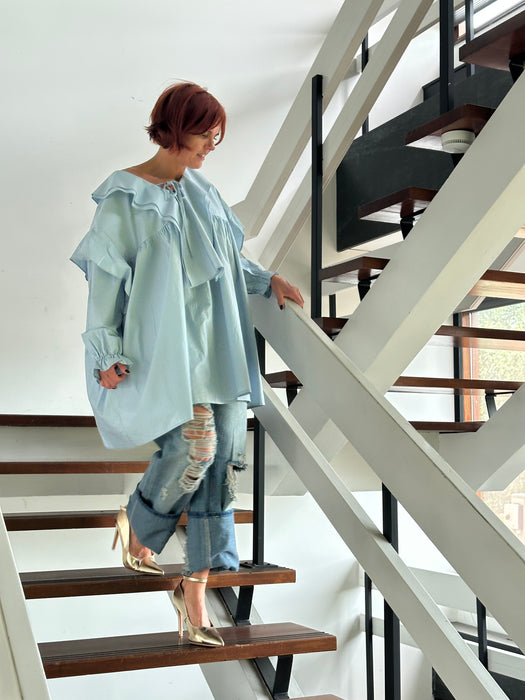 Lichtblauwe roezel blouse