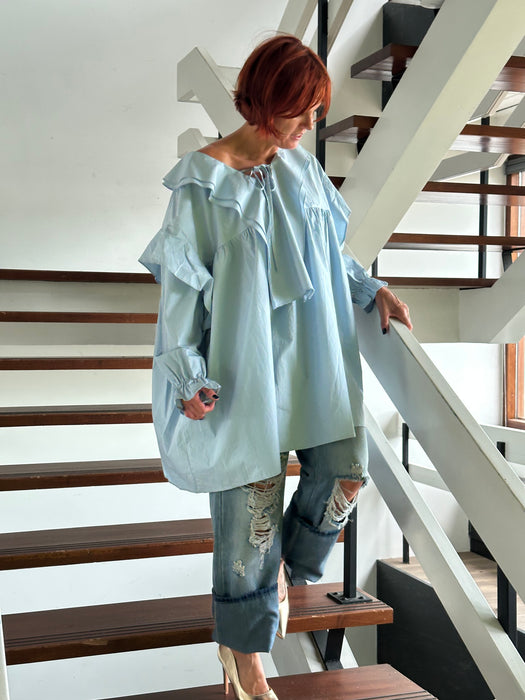 Lichtblauwe roezel blouse