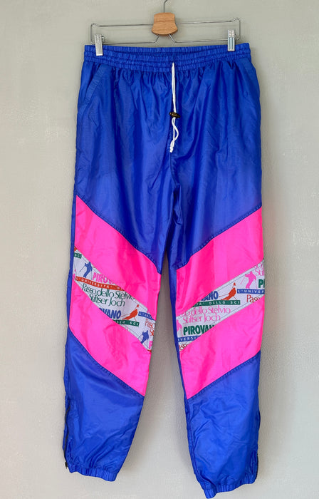 Blauwe 80's trainingsbroek met zuurstok roze