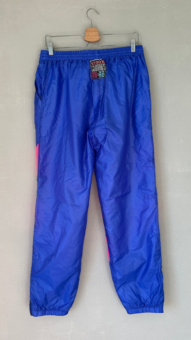 Blauwe 80's trainingsbroek met zuurstok roze