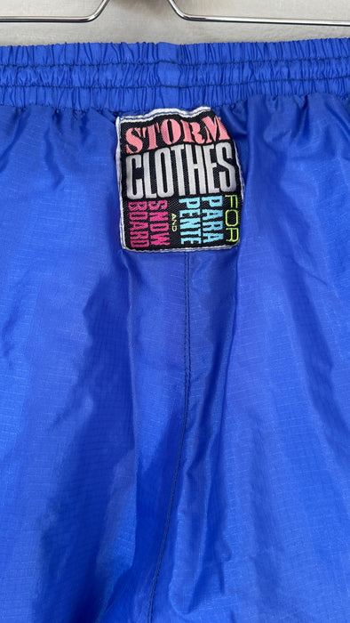 Blauwe 80's trainingsbroek met zuurstok roze